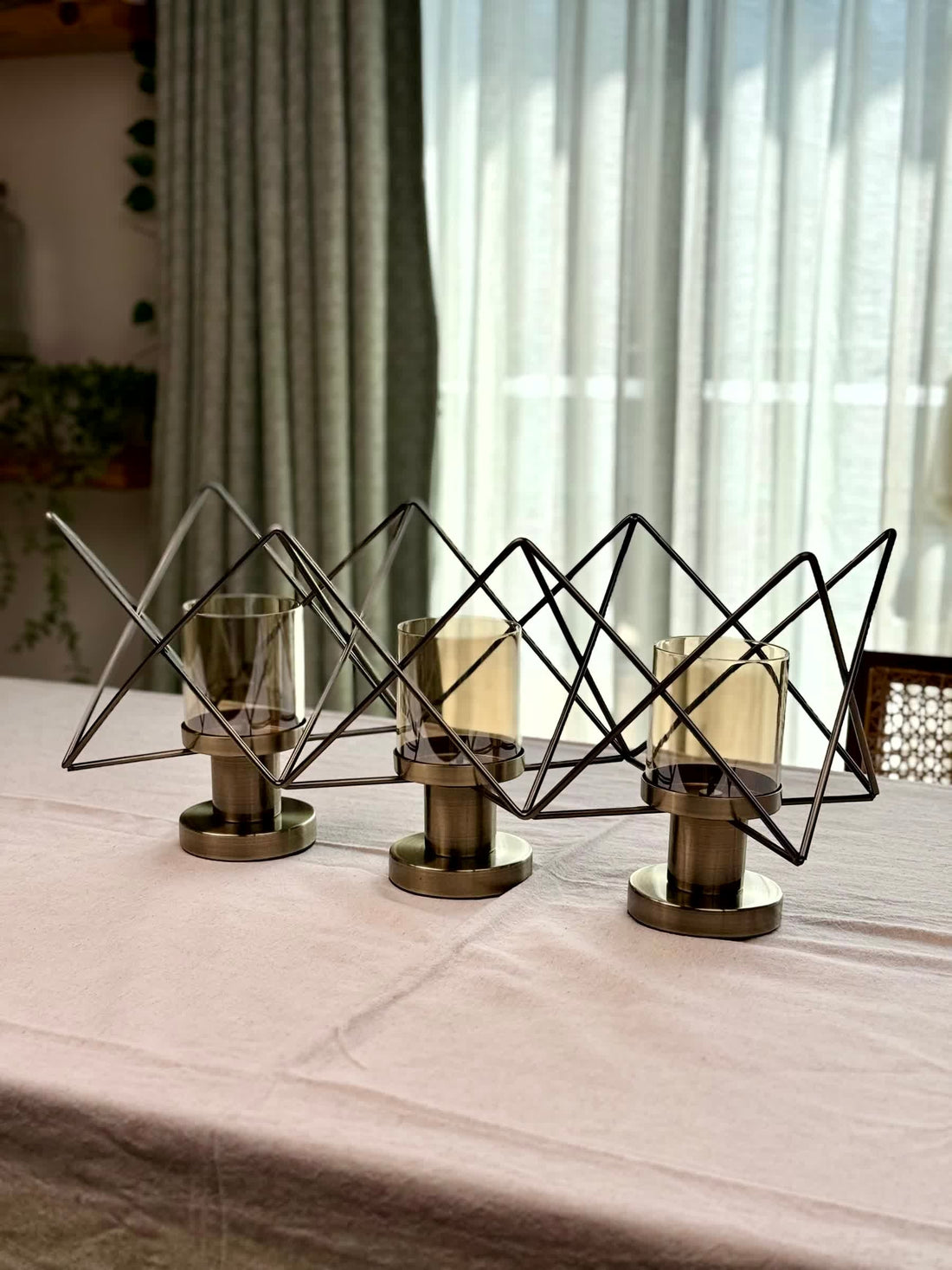 High Objects Zigzag Geo Candle Stand Set with three amber glass holders and brushed metal bases, modern geometric design.