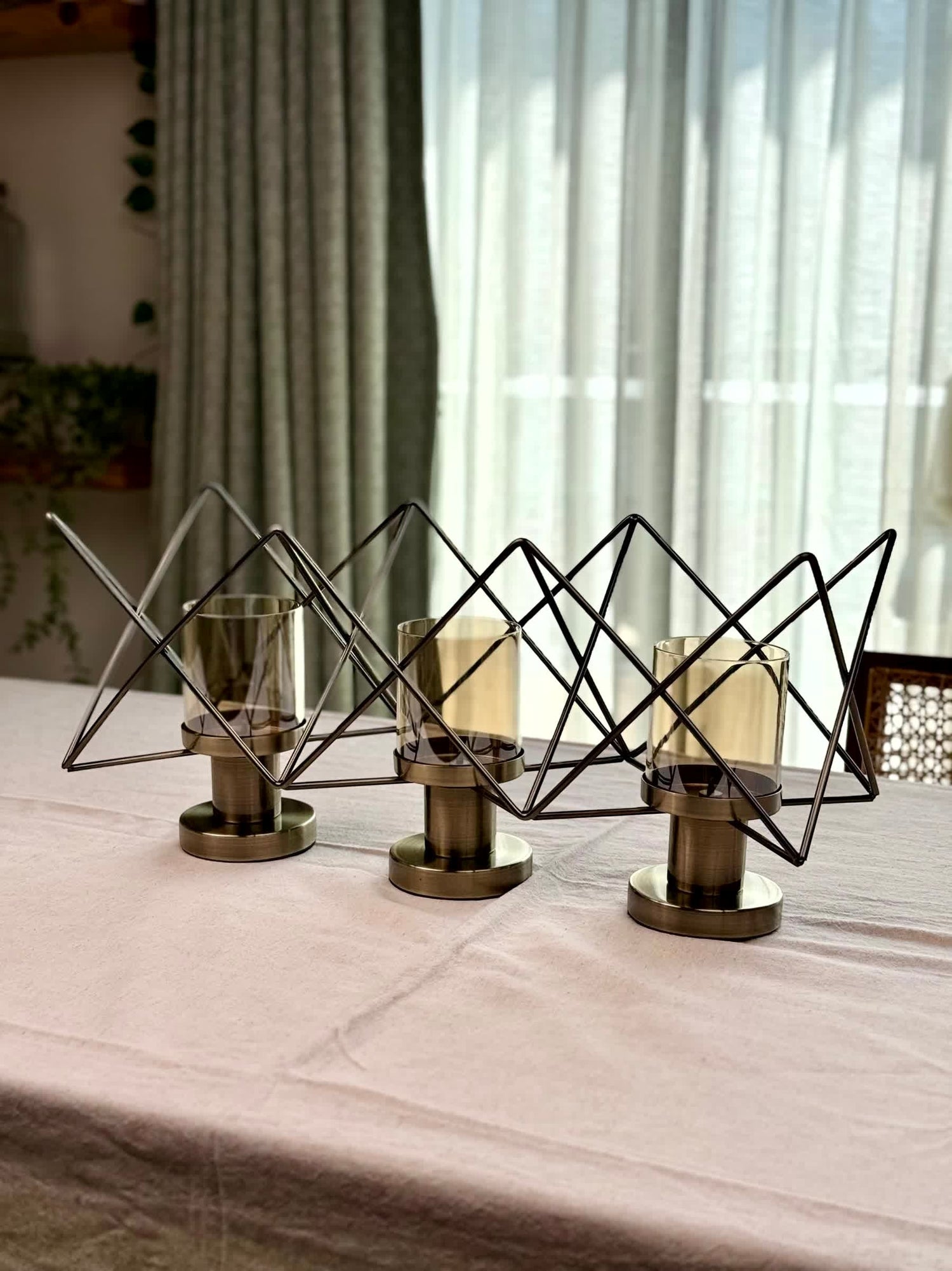High Objects Zigzag Geo Candle Stand Set with three amber glass holders and brushed metal bases, modern geometric design.