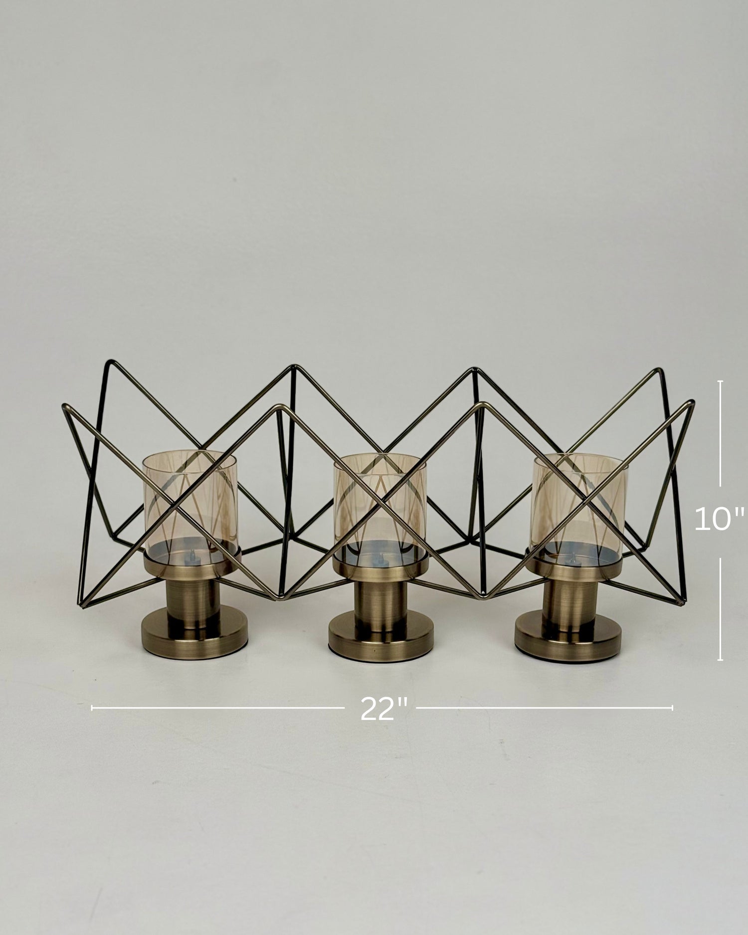 High Objects Zigzag Geo Candle Stand Set with three amber glass holders and brushed metal base, 22" W x 10" H