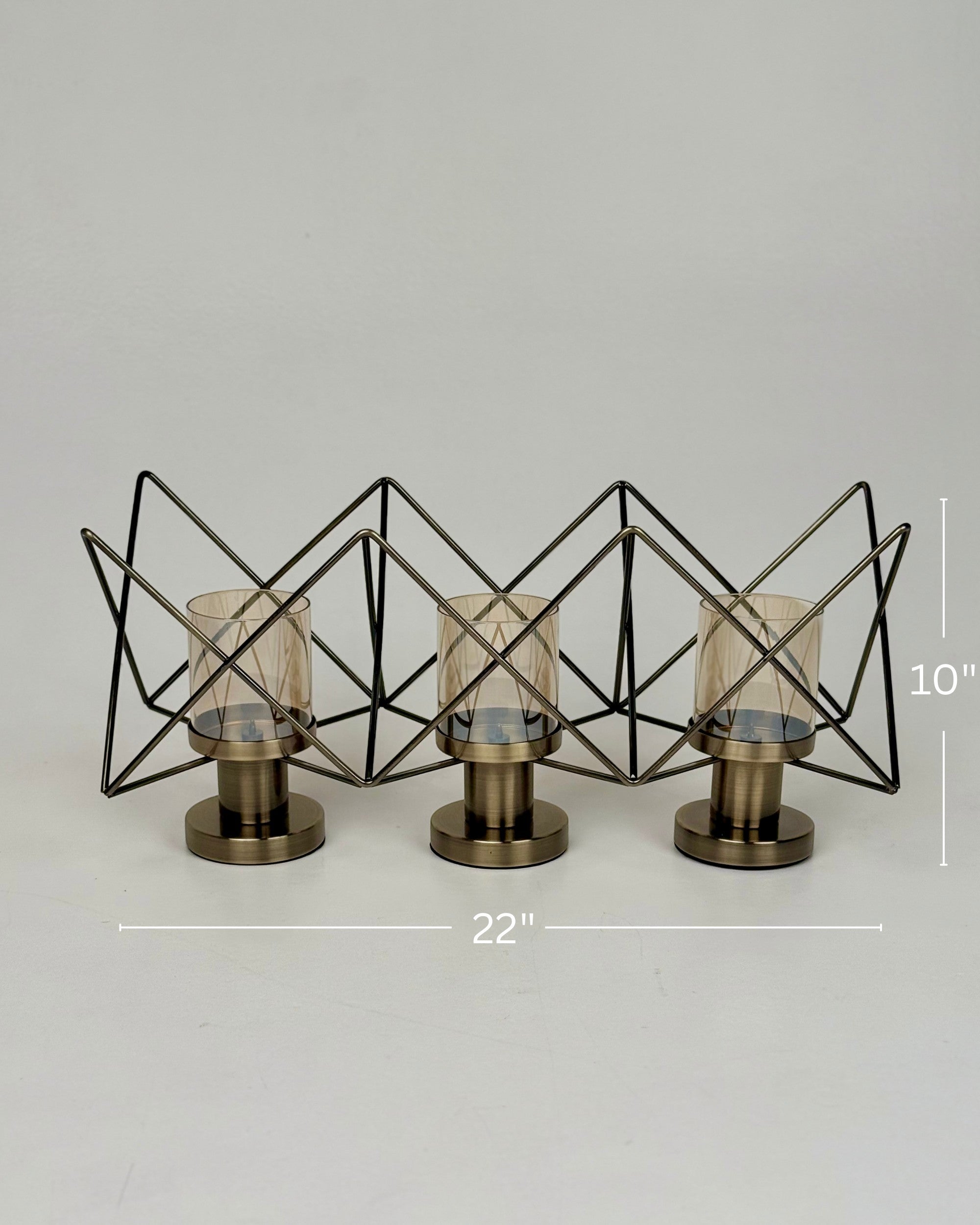 High Objects Zigzag Geo Candle Stand Set with three amber glass holders and brushed metal base, 22" W x 10" H