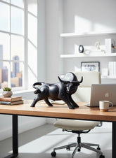 High Objects black matte bull showpiece with curved horns and muscular body, poised for action.