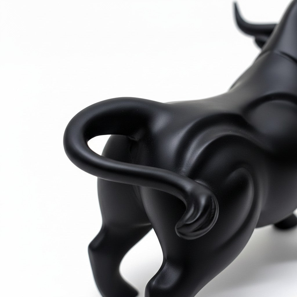 High Objects black matte bull showpiece with curved horns and muscular body, poised for action.
