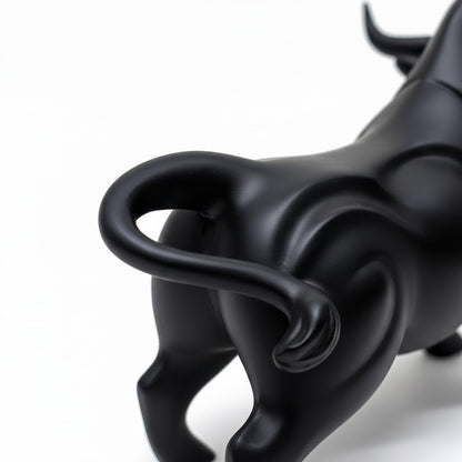 High Objects black matte bull showpiece with curved horns and muscular body, poised for action.
