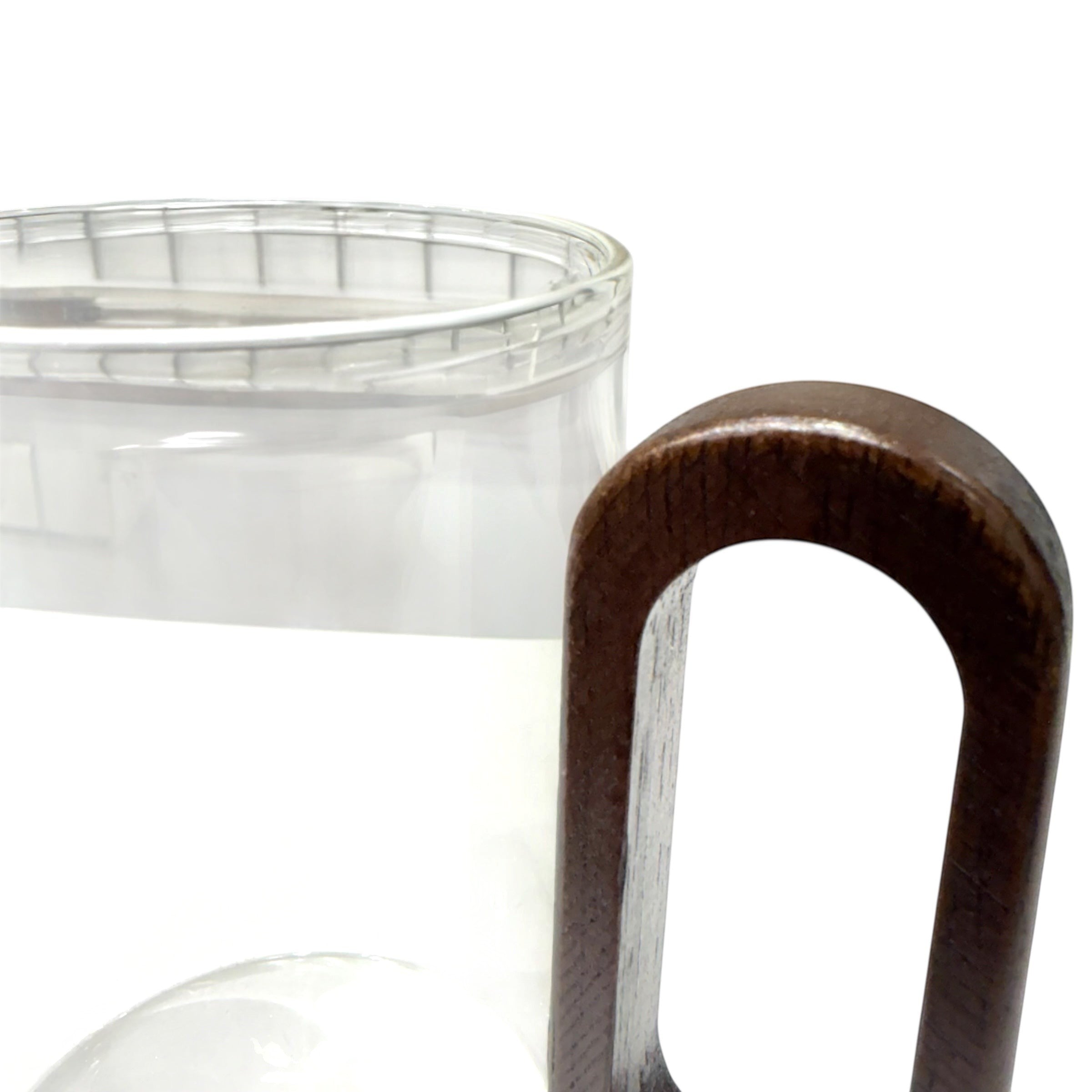 High Objects OBLIQ glass cup with squared dark wood handle, modern minimalist design for coffee or tea.